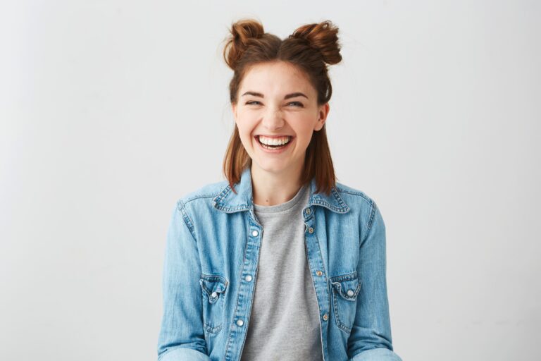 funny_young_happy_cheerful_girl_with_two_buns_laughing_smiling funny_young_happy_cheerful_girl_with_two_buns_laughing_smiling